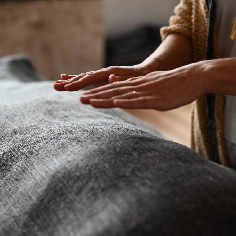 Anja Lenka giving Reiki to a patient