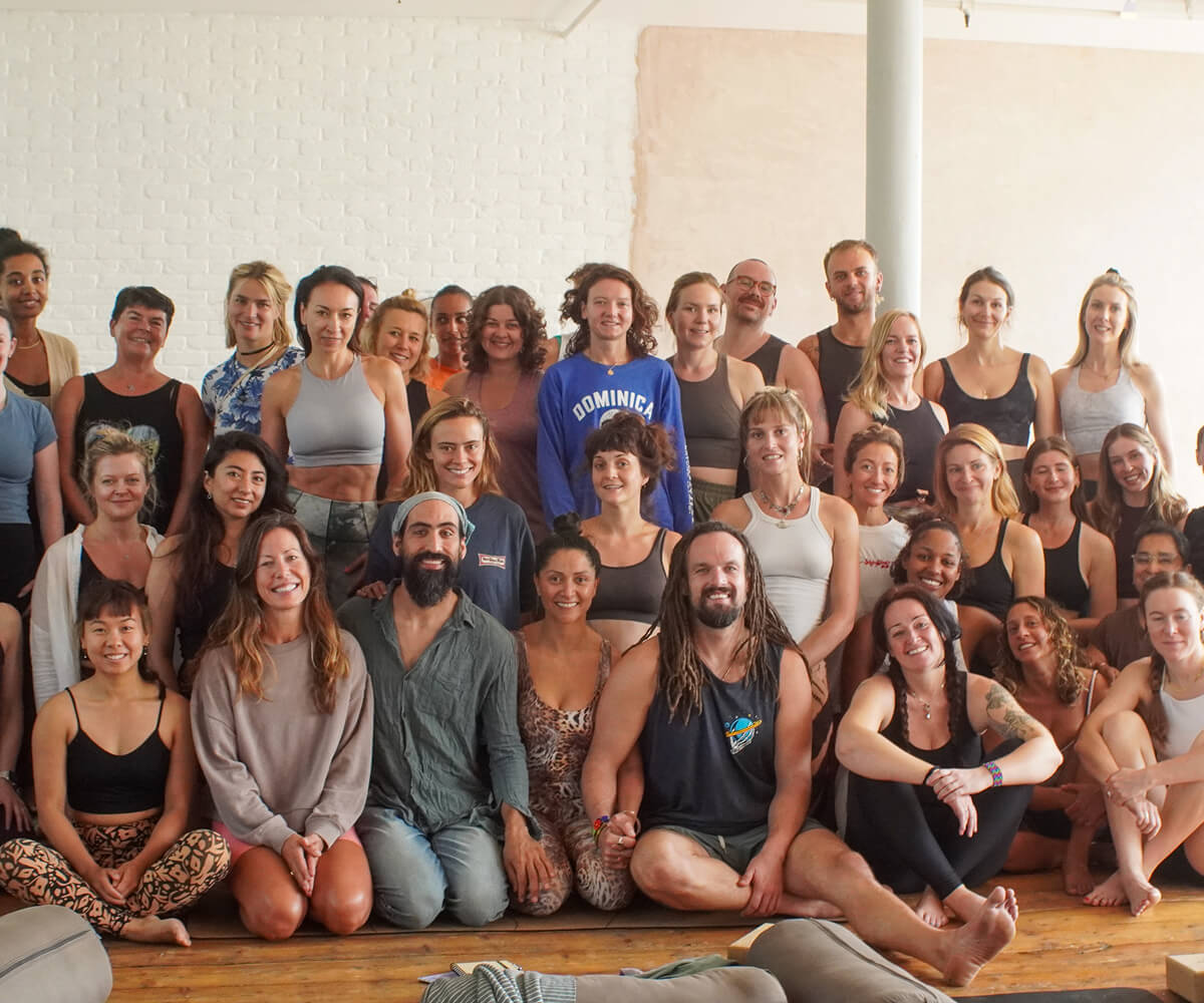 Mandala & Elemental Breathwork team training photograph. The training group smiling.
