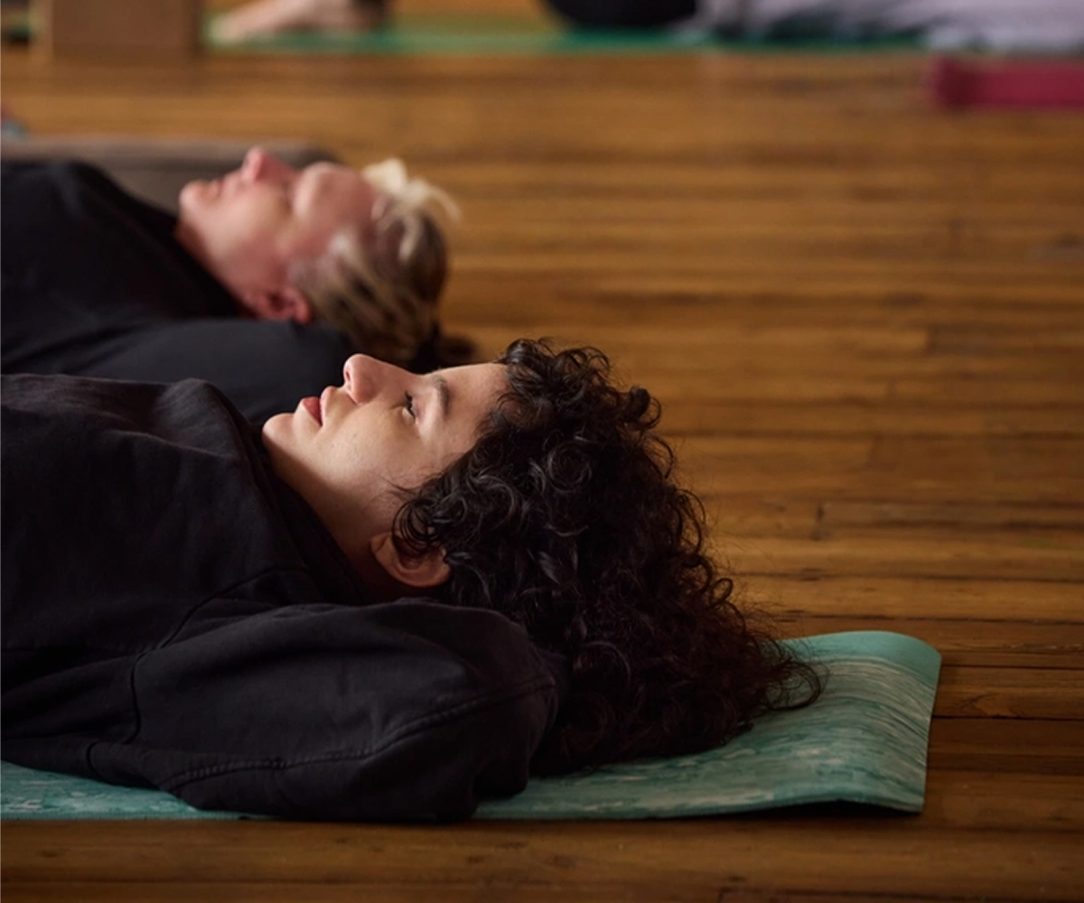 Elemental breathwork - a person lying down and practicing breathwork at Yogarise Peckham