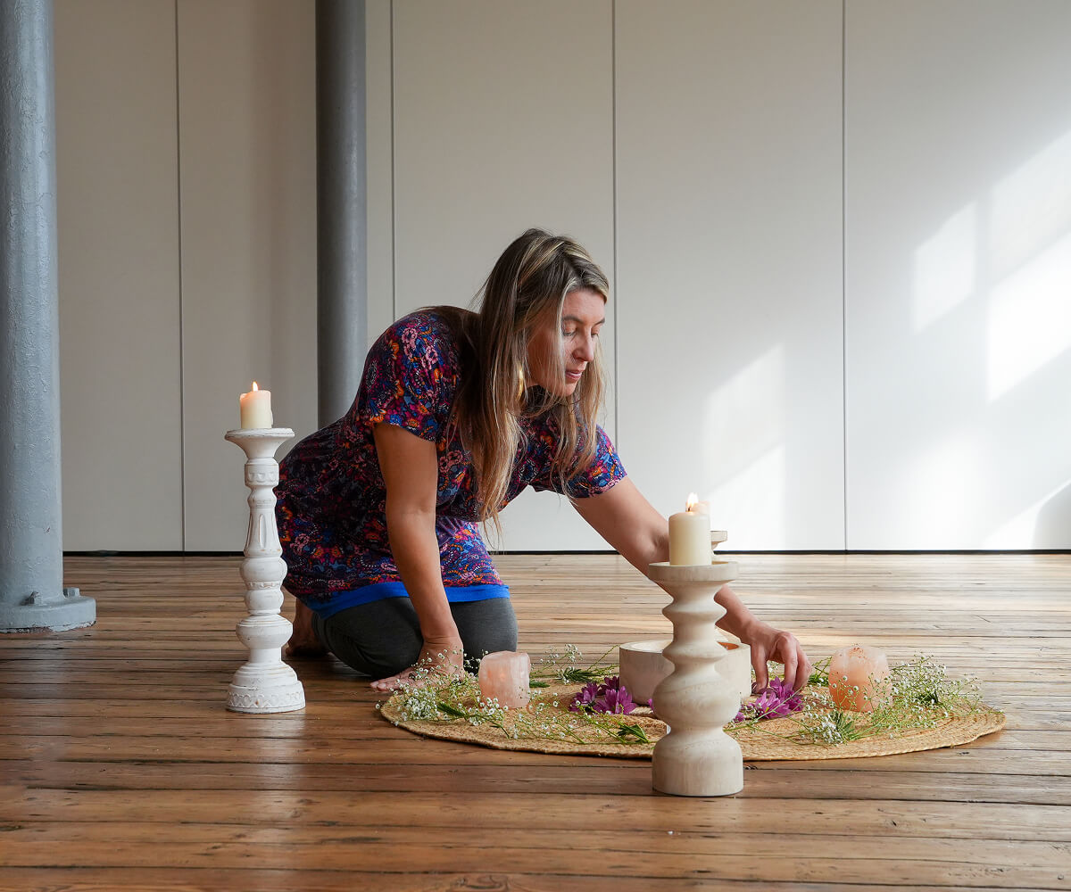 Anna Brook setting up the altar on her Women's Circle training at Yogarise in Peckham, South London